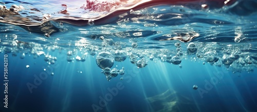 Underwater scene with air bubbles and sunlight.