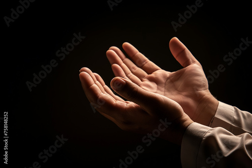 Warm inviting hand gestures on dark background, symbolizing openness and hospitality in cultural context