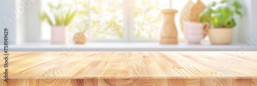 Empty wood table top counter and blur bokeh modern kitchen interior background in clean and bright,Banner, Ready for product montage. empty wooden table top counter on interior kutchen background