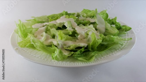 Preparation of Caesar salad with salmon. Stop motion.