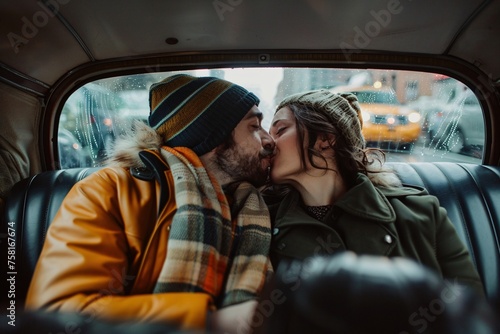 An adult couple sharing a tender moment in the back of a taxi, stealing a kiss as they sit close together, excitedly anticipating the start of their romantic vacation getaway © Maelgoa