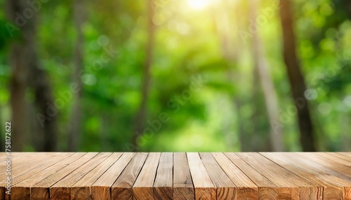 blurred green nature background with wooden table for mockup or product display table platform with customizable space on table top for editing