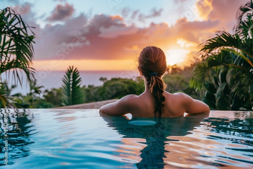 A captivating woman posing by a Caribbean infinity pool, the shimmering water reflecting the vibrant hues of the tropical sunset