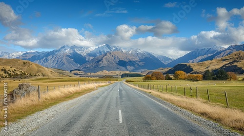 Scenic drive: queenstown to wanaka via crown range, capturing the majestic landscape of rocky mountains and serene grasslands © Ashi