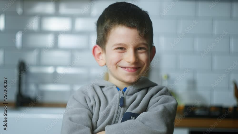 Close-up portrait of cute little boy looking at camera smiling, making funny mimics. Close-up portrait of cute little boy looking at camera smiling, making funny mimics.