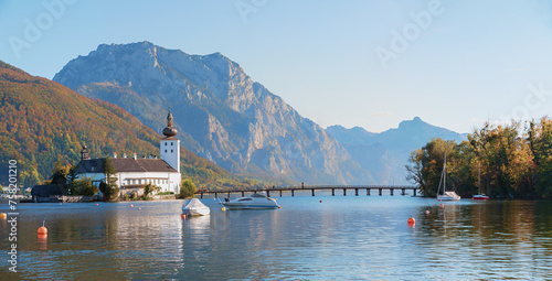 lake Traunsee and Ort castle with footbridge to the island, austrian landscape Gmunden