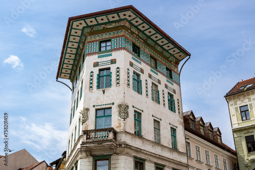 Hauptmann House, beautiful building located in  Prešeren square (Prešernov trg) in front of Franciscan Church of the Annunciation Ljubljana, Slovenia.  photo