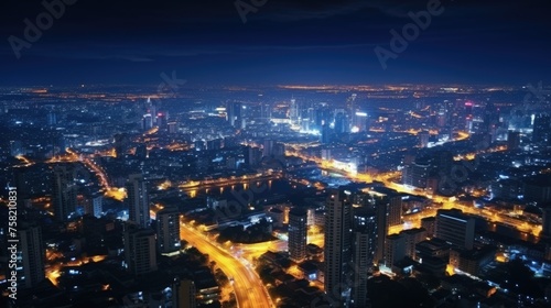 A stunning aerial view of a city at night. Perfect for urban landscape concepts