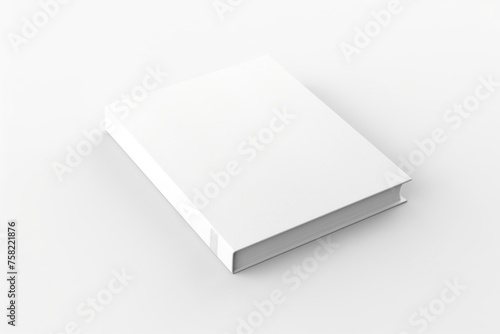 A white book on a white surface. Suitable for educational concepts © Fotograf