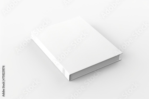 A white book on a white surface. Suitable for educational concepts