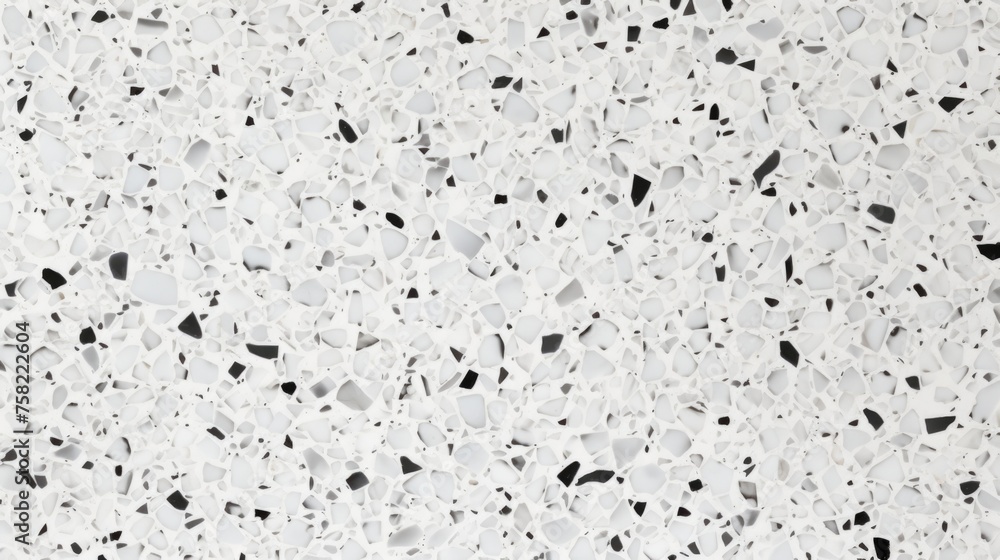 Close up of a white and black speckled floor, suitable for interior design projects