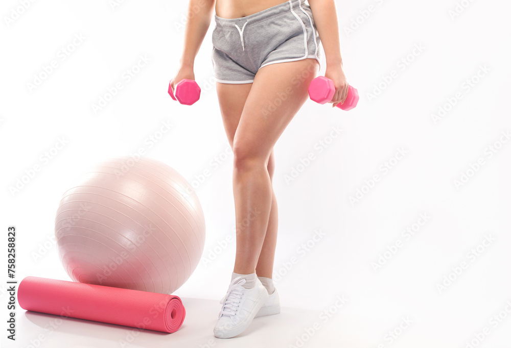 +sixe model girl lifts a heavy weight, cardio workout. Sports concept, fat burning and healthy lifestyle. +sixe model girl lifts a heavy weight, cardio workout. Sports concept, fat burning and healthy lifestyle.