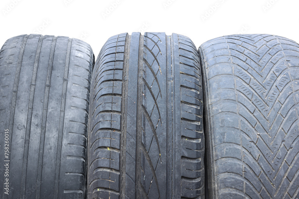 Fototapeta premium old worn damaged tires isolated on white background