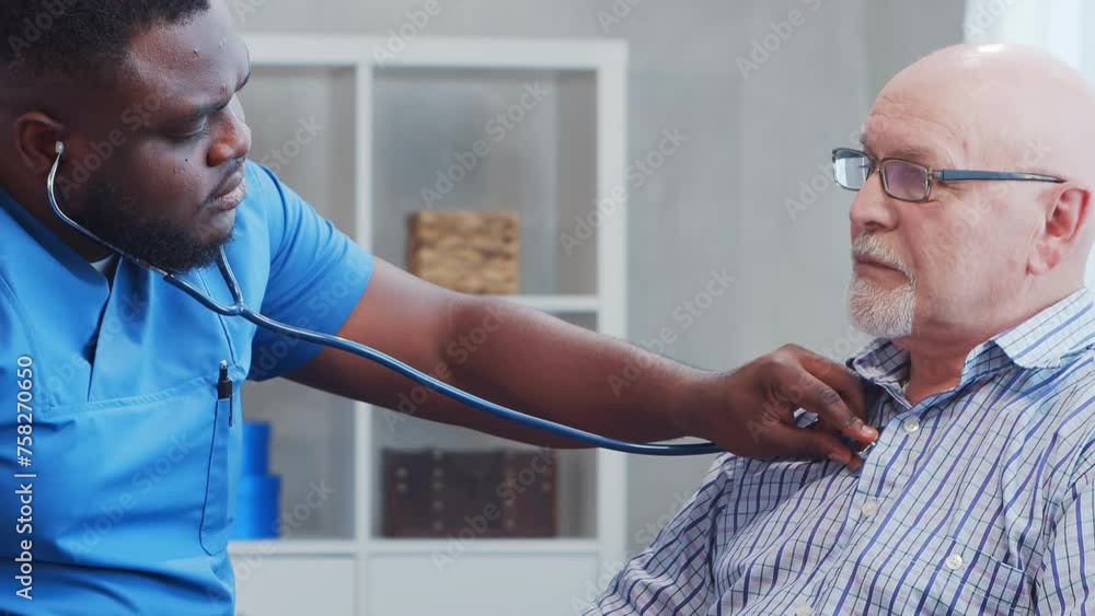 African-American caregiver and old man. Professional nurse and patient in a nursing home. Assistance, rehabilitation and health care concept. African-American caregiver and old man. Professional nurse and patient in a nursing home. Assistance, rehabilitation and health care concept.