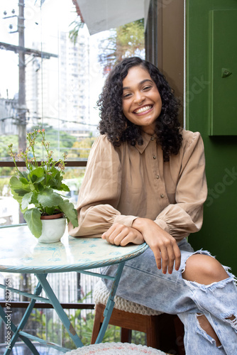 Portrait of a brazilian woman indoors at home