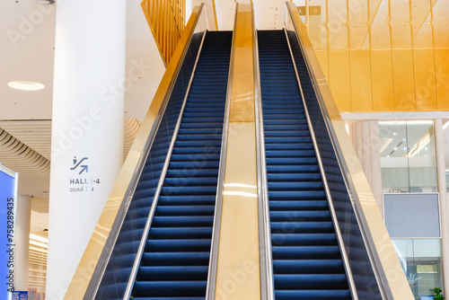 Modern luxury Escalators in an office building or shopping mall, escalator in the subway or airport.