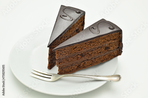 Two Pieces of Sacher torte on white Plate