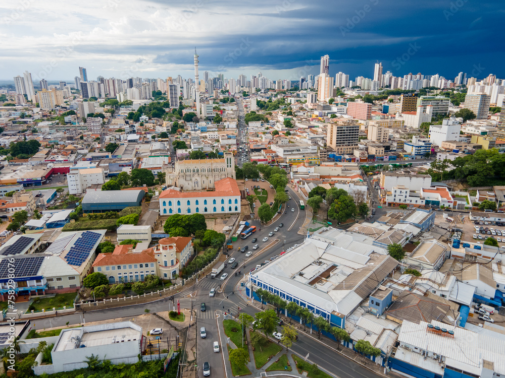 Fototapeta premium Aerial city scape in summer with storm clouds in Cuiaba Mato Grosso
