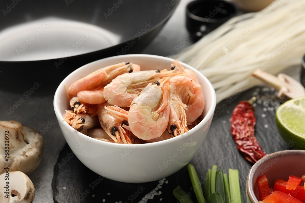 Different products for cooking wok on table, closeup Different products for cooking wok on table, closeup
