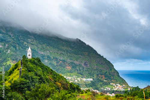 Capelinha de Nossa Senhora de Fatima in Madeira Portugal. Traditional architecture and green tropical landscape of tourist attraction on island resort