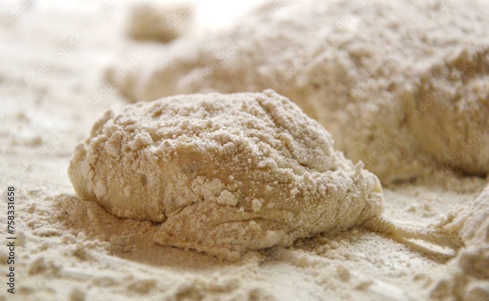 Raw dough of a traditional South Tyrolean bread, Val Venosta Paarl, prepared in a bakery Raw dough of a traditional South Tyrolean bread, Val Venosta Paarl, prepared in a bakery