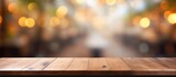 A hardwood plank table featuring a wood stain pattern, set against a blurry street background. Macro photography highlights the tints and shades of the lumber