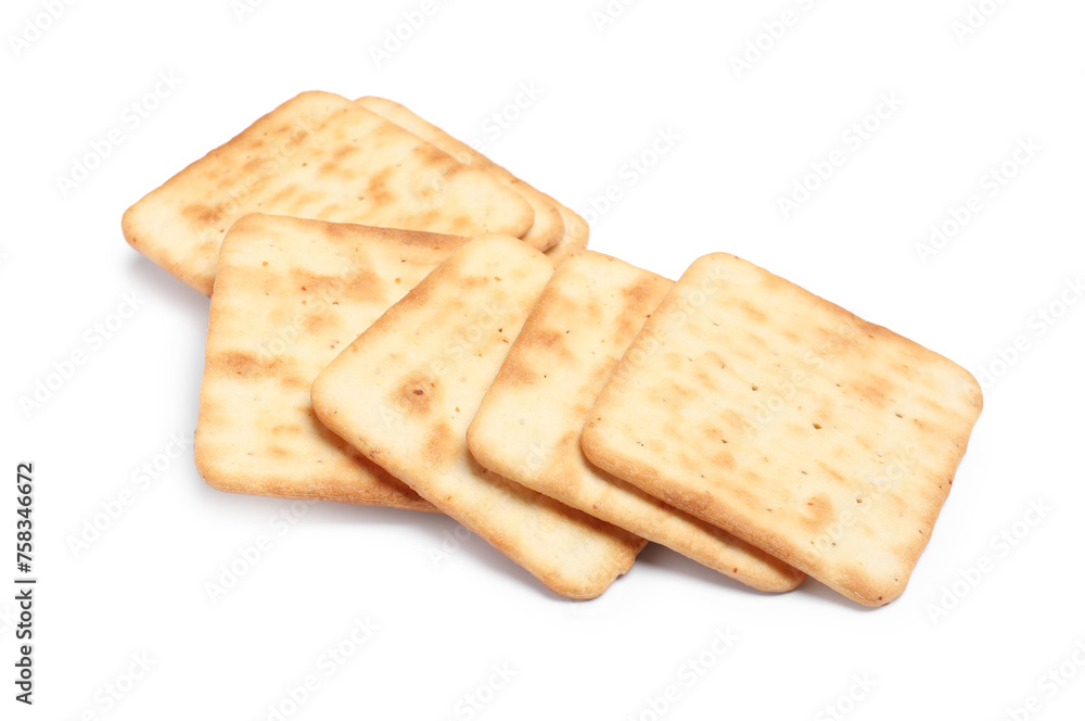 Tasty crispy square crackers isolated on white Tasty crispy square crackers isolated on white