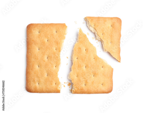Crispy broken cracker isolated on white, top view