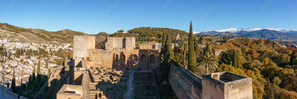 Albaicin with mountains of Sierra Nevada in background seen from the fortress walls of the Alhambra, Granada, Andalusia, Spain