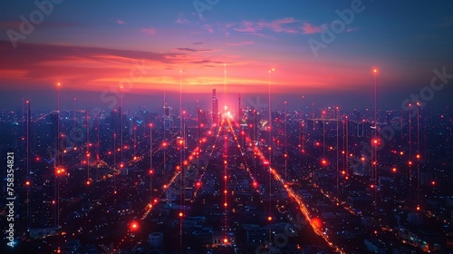 Aerial cityscape at twilight with radiant street lights and illuminated buildings under a vibrant sunset sky