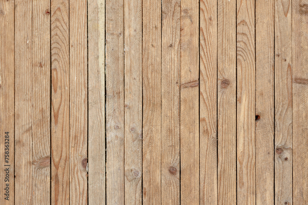 A wooden background with a few small holes in it A wooden background with a few small holes in it