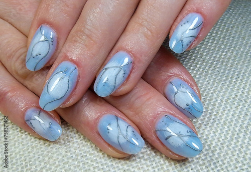 Gel painted nails. Professional fashionable manicure