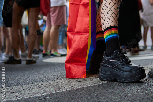 Diverse Legs and Rainbow Socks at Pride March photo