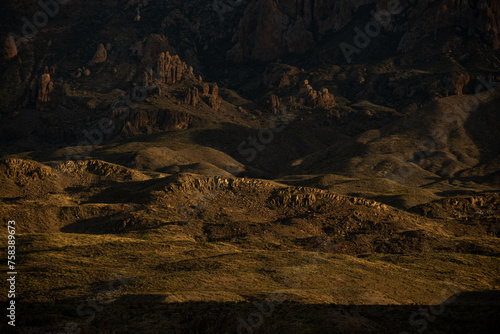 Hills and Rocky Outcroppings Are Highlighted By The Evening Sun