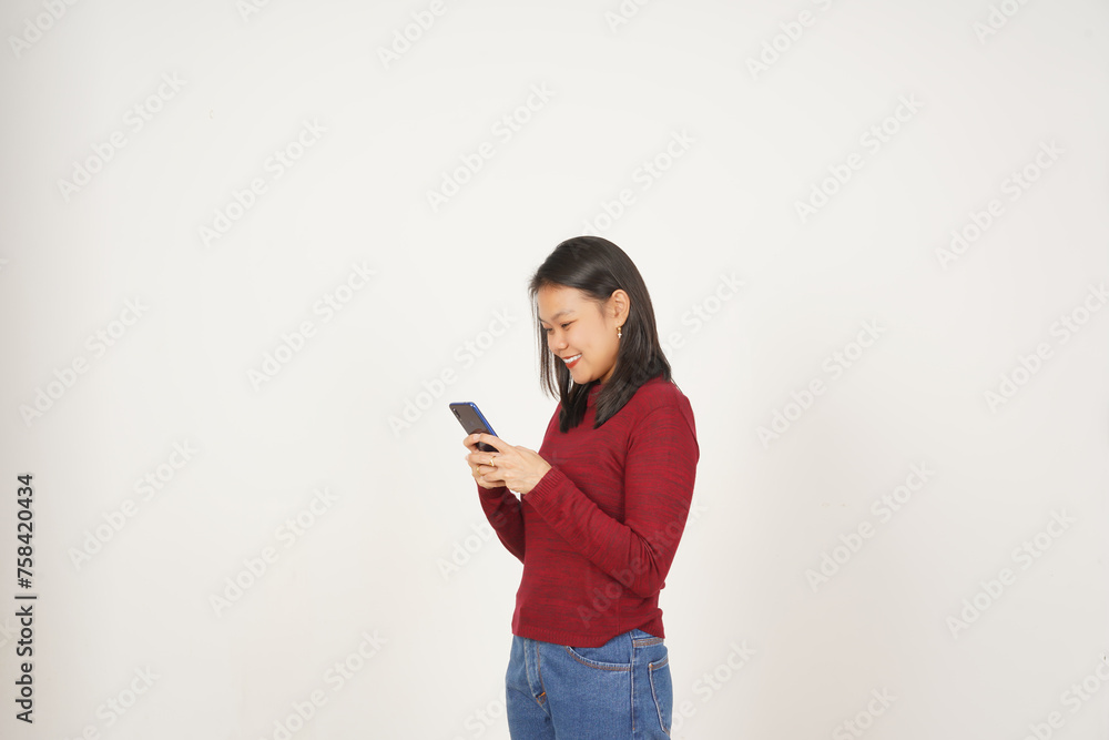 Young Asian woman in Red t-shirt Smile while using smartphone, Texting concept isolated on white background