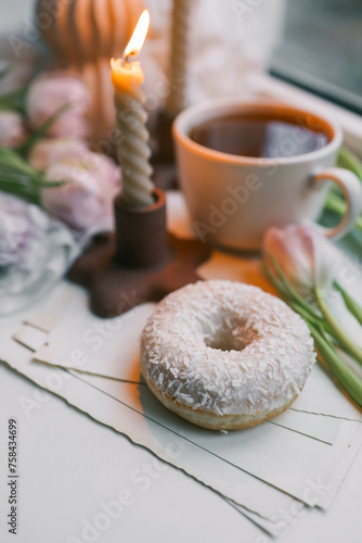 Donut and tea in a spring atmosphere