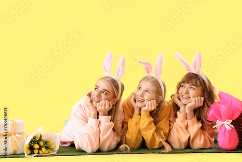 Young girl with bunny ears ...