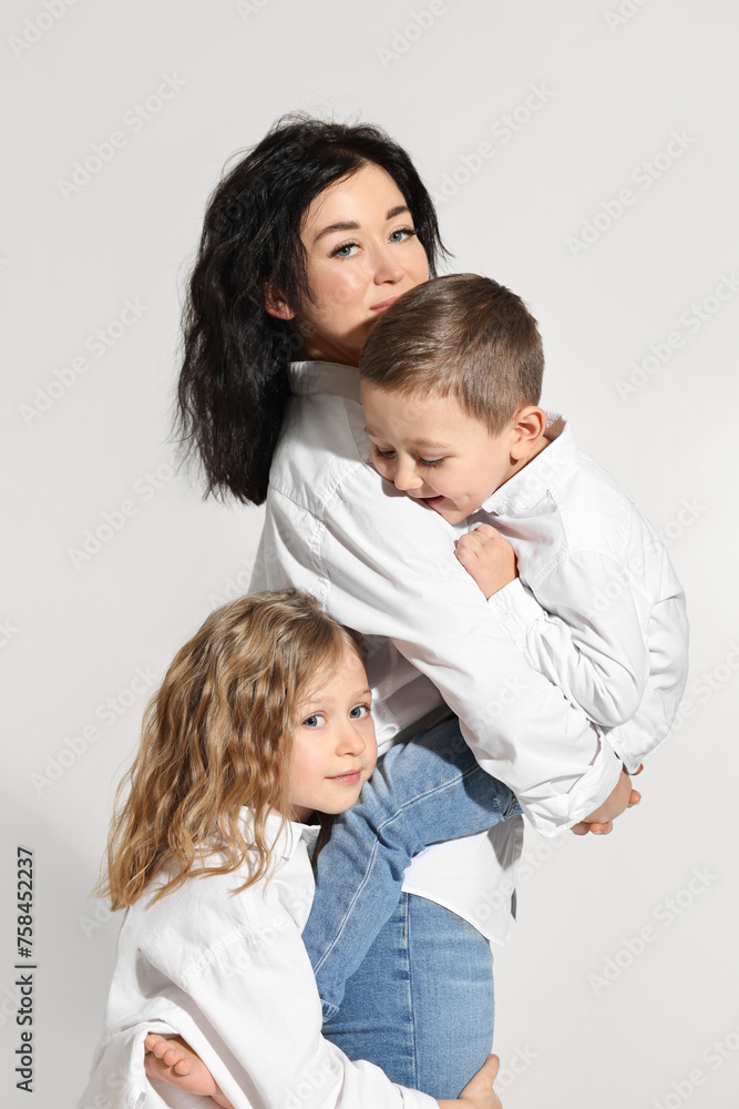Little children with their mother on white background Little children with their mother on white background