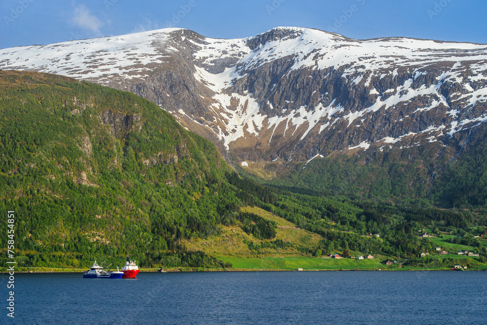 Mountains and Fiord over Norwegian Village, Olden, Innvikfjorden, Norway, Europe