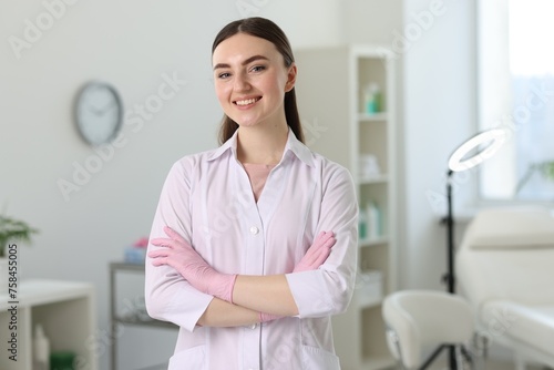 Cosmetologist in medical uniform in modern clinic