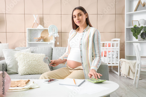Pregnant woman managing fin...