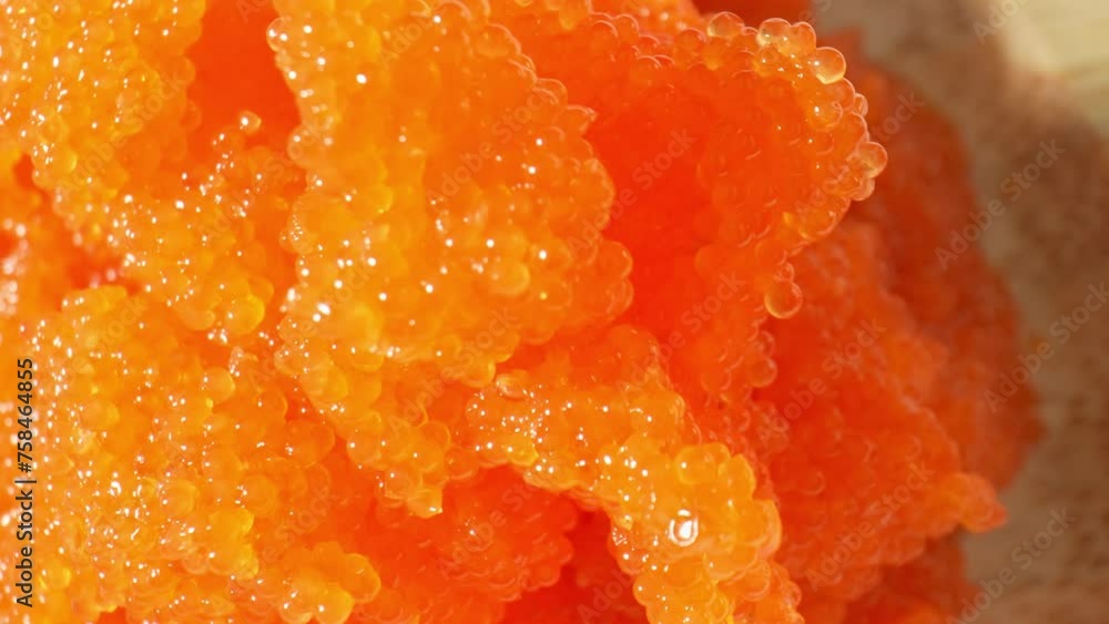 Tobiko, flying fish roe from the Tobiuo species, prized in Japanese cuisine, especially sushi. Distinct appearance and flavor, sought-after delicacy. Seafood concept. Tobiko background. 4K HDR. Tobiko, flying fish roe from the Tobiuo species, prized in Japanese cuisine, especially sushi. Distinct appearance and flavor, sought-after delicacy. Seafood concept. Tobiko background. 4K HDR.