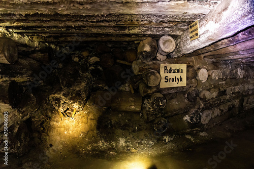 Inside dark old salt mine wooden cave vintage architecture