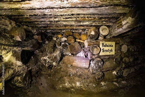 Inside dark old salt mine wooden cave vintage architecture