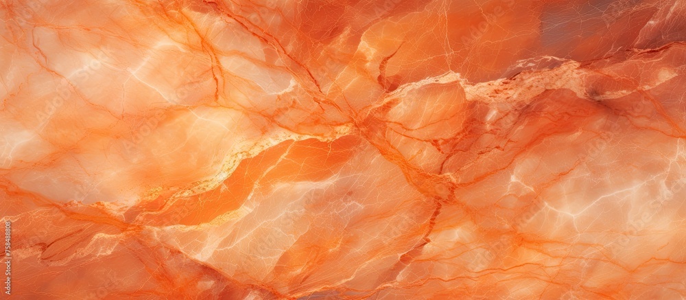 A closeup photo of a piece of ambercolored paper with a marble texture, resembling wood. The artistic pattern creates a peachyorange hue, perfect for macro photography enthusiasts