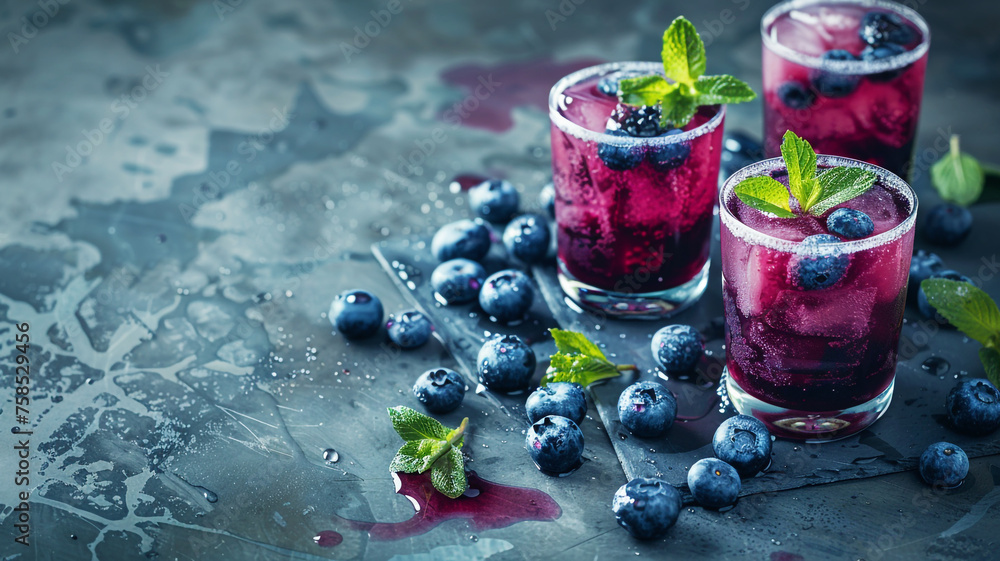 Blueberry juice in glasses Blueberry juice in glasses