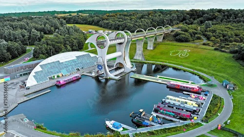 Aerial view of The Falkirk Wheel,  tourist attraction in Falkirk, Scotland. Rotating boat lift connecting the Forth and Clyde Canal with the Union Canal with ships and boats. photo