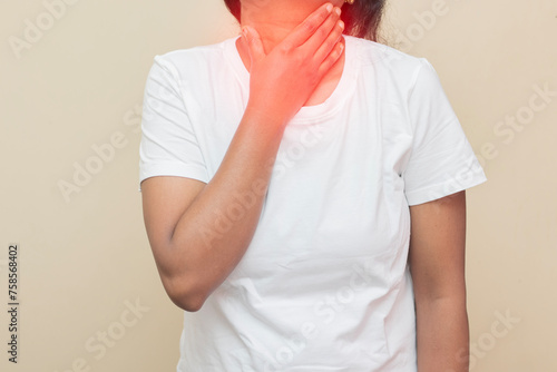 imitative representation of an Indian lady feeling throat discomfort. 