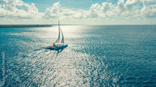 drone shoot of the boats in the caribbean sea in a sunny day photo