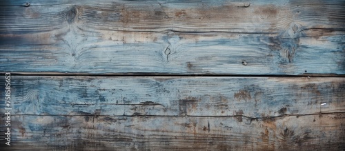 A detailed shot of a rectangular blue wooden surface with a unique pattern, showcasing the beauty of wood as a building material and art